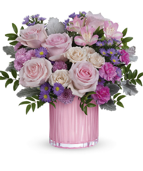 feminine pink flower arrangement in pearlescent vase