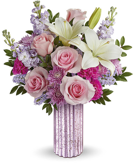 pink and lavender bouquet in wildflower style with roses, lilies, chrysanthemums, and more