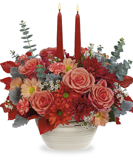 fall toned floral arrangement in centerpiece style
