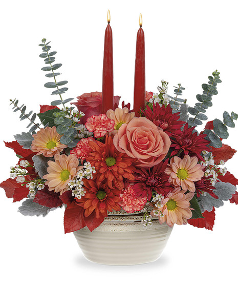 fall toned floral arrangement in centerpiece style